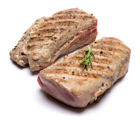 grilled cooked piece of tuna fillet isolated on white background