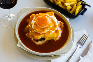 Francesinha - typical food from Porto. Portuguese cuisine