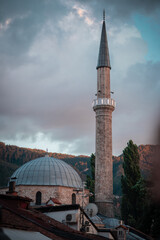 Minaret of the central mosuqe in the Sarajevo downtown, looking from the main square. Cloudy but...