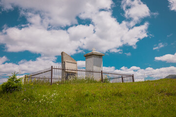 Monument of aleksander the king or kralj, on top of cakor mountain plateau between Montenegro and Kosovo. Monument surrounded by metal fence.