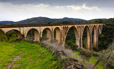 Fototapeta na wymiar Picturesque view of old railway Guadalupe Viaduct, Extremadura, Spain