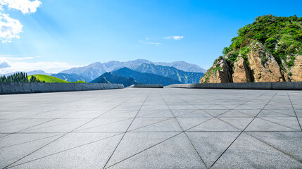 Empty square floor and mountain nature landscape under blue sky