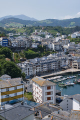 Fototapeta na wymiar coastal village on the green hills on the Cantabrian coast, Luarca, Asturias