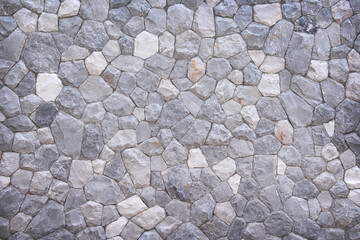 Stone wall grey light background with seamless patterns
