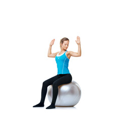 Obraz na płótnie Canvas Woman, ball or body balance on a white background space for workout, wellness or mobility exercise. Female athlete training, hands up or fitness for mockup, back posture or flexibility in studio