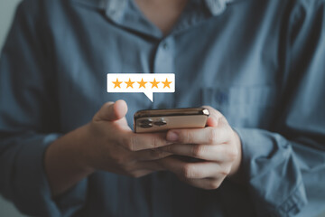 Satisfaction survey, Customer experience, feedback rating and online survey with best score concept. Customer using mobile smartphone for giving satisfaction with five star excellent experience.