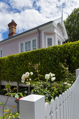 Victorian wooden house with garden. Ponsonby Road Auckland New Zealand. Roses.