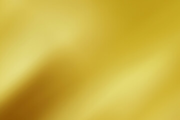 Abstract gold gredient metal color theme satin texture background. Lighting effects of flash. Blurred background with light glare.