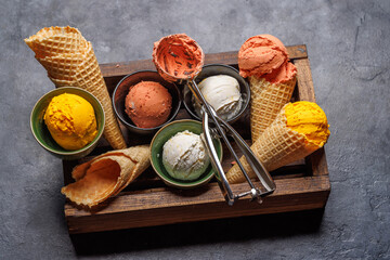 Assorted ice cream flavours in delightful waffle cones