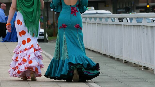 Traditional Spanish flamenco dresses (traje de flamenca or traje de gitana)