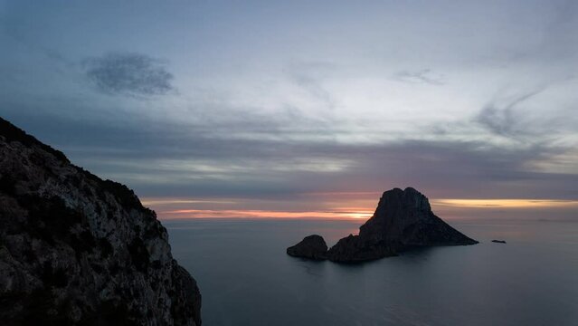 Timelapse of Es Vedra at Sunset off Ibiza s Coastline