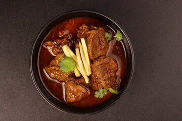 Nihari or Beef Shank Stew is Indian Beef Stew with Large Chunks of Beef Shanks in a Gravy Sauce.