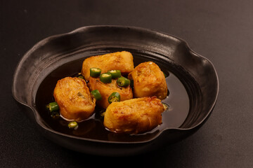 Gohyong is One of the Influences of Chinese Food on Indonesian Cuisine. Made from Minced Chicken with Flour Wrap Served with Brown Sweet and Sour Sauce.