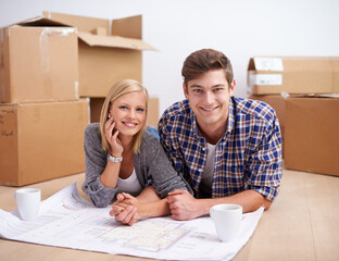Man, woman and portrait with floor plan of new home for renovation or moving boxes, apartment or...