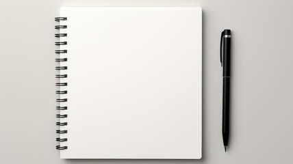 Minimalist composition of a spiral notebook with a matching pen, centered on a bold, monochrome background - obrazy, fototapety, plakaty