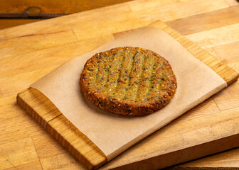 Vegetarian cutlet without meat on a wooden board