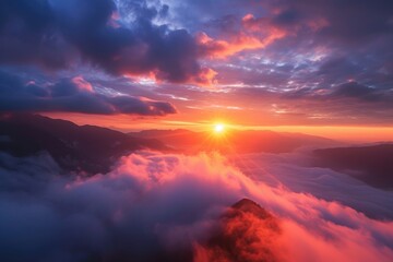 Ethereal Peaks: Sunrise Unfolds in the Mountain Mist