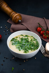 Georgian food soup chikhirtma with chicken and herbs.