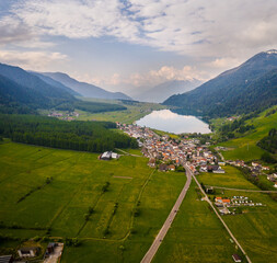 Reschensee Italy Aerial Panorama. Mountain Valley with lake Reschen