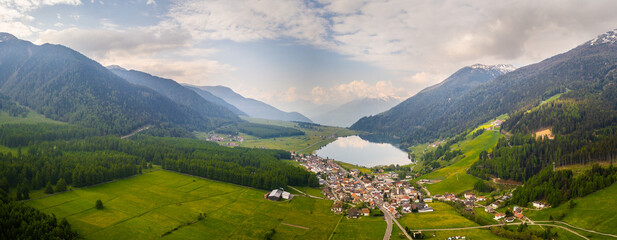 Reschensee Italy Aerial Panorama. Mountain Valley with lake Reschen