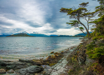 Mesmerizing landscapes with lush vegetaion, snow covered mountains and beaches, Tierra del Fuego National Park, Ushuaia, Patagonia, Argentina