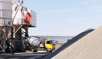 Banner cement factory, concrete loading to Mixer truck on manufacturing plant © Parilov