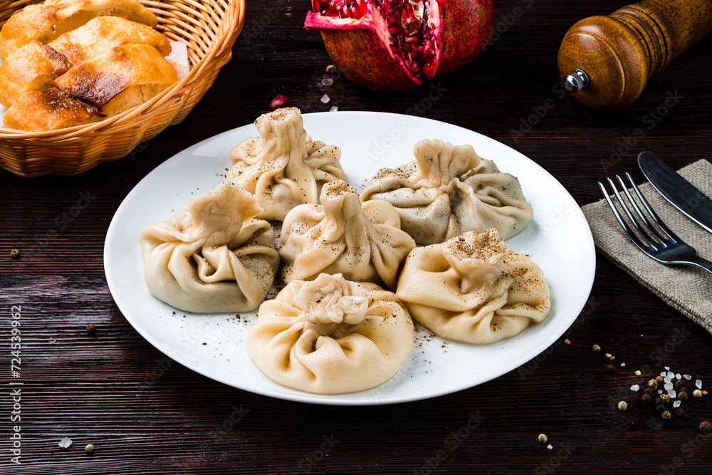 Wall mural manti with lamb meat, pepper and bread in plate.