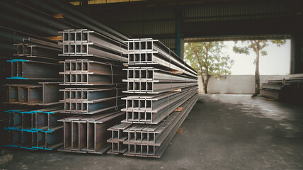 Metal forming steel beams at the metal products warehouse, H-beam steel and Wi-Frank steel. For large structures or building columns, focus only on the raw materials used in building construction.