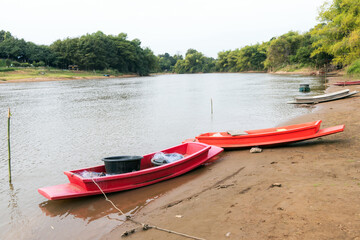 Boat with fishing equipment for catch fish floating in the river or local fishery concept. 