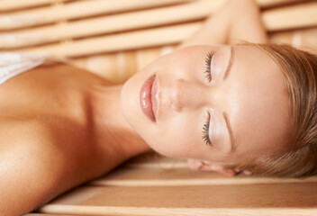 Woman, peace and wellness in sauna for health, detox and sweat for skincare, heat therapy and anti...