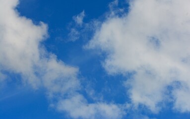 Obraz premium photo of white sky and bright blue clouds