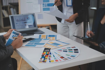 Close up ux developer and ui designer use augmented reality brainstorming about mobile app...