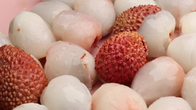 Lychee fruits, rotation in circle. tropical fruit lychee, Turning. selective focus.	