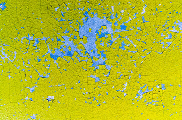 texture old wall with yellow paint close up