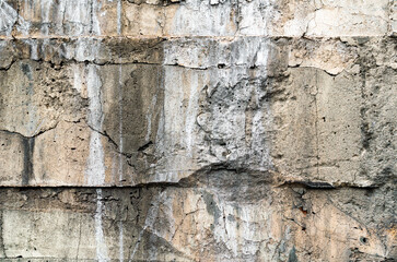 Fototapeta premium texture old concrete wall with traces of white paint.