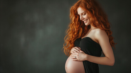 pregnant redhead woman in studio photo