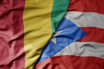 Obraz premium big waving national colorful flag of and national flag of guinea .