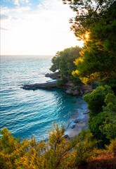 Rocky dalmatian coast near “Zlatni rat“  famous beach in Bol on Brac island in Croatia....