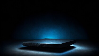 black stone platform podium with blue color light on black background for product display presentation and advertising copy space - obrazy, fototapety, plakaty