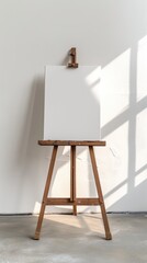 Easel with white paper sheet
