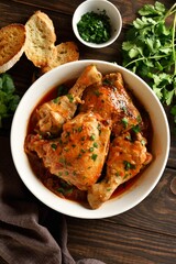 Georgian chicken stew with tomatoes and herbs