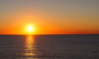 Fototapeta premium a beautiful sunset at sea on the island of Aruba generated with artificial intelligence