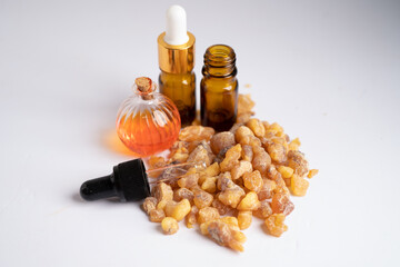 Frankincense or olibanum aromatic resin isolated on white background used in incense and perfumes.