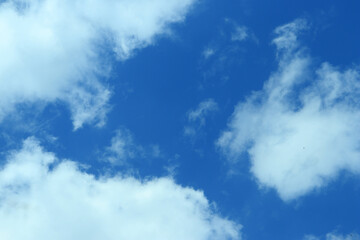 Cloudscape - Blue sky and white clouds, wide panorama