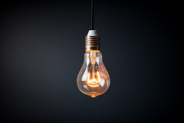 light bulb closeup against a dark background