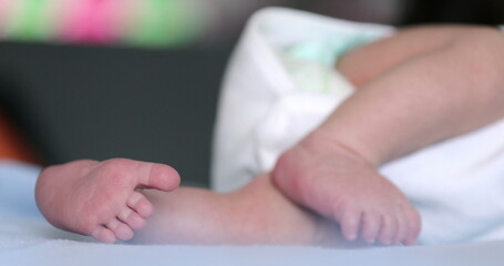 Newborn baby feet close-up, infant toddler foot