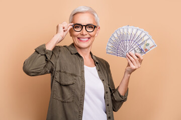 Portrait of grey short hair businesswoman received her compensation financial support for bankrupts...