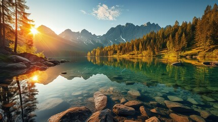 Impressive summer sunrise on Eibsee lake with Zugspitze mountain range. Sunny outdoor scene in German Alps, Bavaria, Germany, Europe. Beauty of nature - obrazy, fototapety, plakaty
