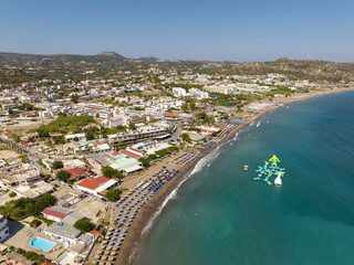 Faliraki bay area and coastline in Rhodes greece on a beautiful day with waterfront resorts and the Mediterranean Sea