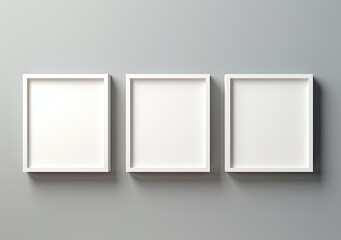 Empty white picture frames displayed against a white indoor wall, serving as a template or mock-up background.